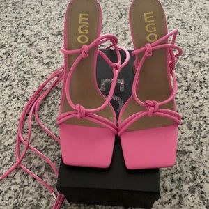 Long strap pink shoes, never worn.